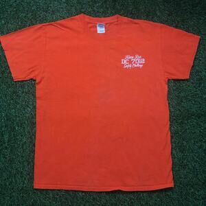 Orange DC 7012 Home Run Safety Challenge Graphic Tee